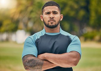 Image showing Rugby, field and portrait of confident man with serious expression, confidence and pride in winning game. Fitness, sports and proud face of player at match, workout or competition on grass at stadium