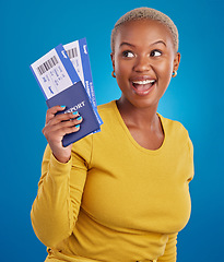 Image showing Smile, travel passport and black woman in studio on blue background with flight documents, tickets and ID. Traveling mockup, happy and girl celebrate immigration, holiday and international vacation