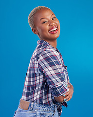 Image showing Happy, smile and portrait of black woman with confidence, happiness and empowerment in studio. Fashion, beauty and girl model laughing on blue background with pride, positive mindset and motivation