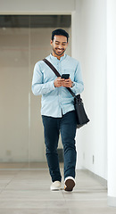 Image showing Phone, walking and young man typing on online communication, networking or reading social media post. Asian man or worker on smartphone, cellphone or mobile app chat for website, opportunity or news