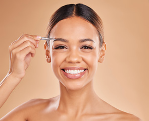 Image showing Beauty, eyebrows and portrait of woman and tweezers in studio for clean, self care and cosmetics. Facial, plucking and shape with female model on brown background for hair removal and skincare