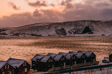 Image showing Traditional Norwegian fisherman's cabins and boats