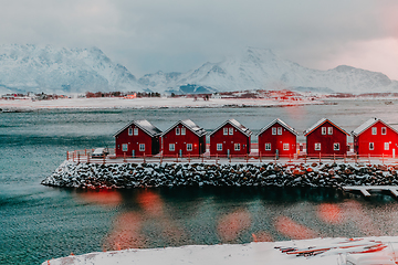 Image showing Traditional Norwegian fisherman's cabins and boats