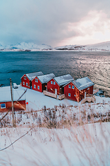 Image showing Traditional Norwegian fisherman's cabins and boats