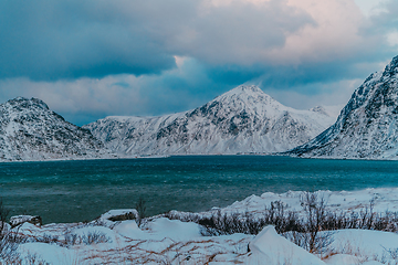 Image showing Norway coast in winter with snow bad cloudy weather