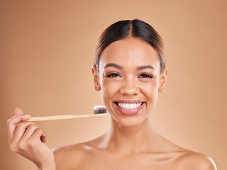 Image showing Portrait, toothpaste or girl brushing teeth with product for healthy oral or dental hygiene in studio. Face model, smile beauty or happy woman cleaning mouth with a natural bamboo wooden toothbrush