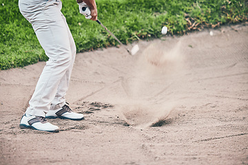 Image showing Golf course, man and swing in sand pit for shot, sports and training for hazard with power, aim and fitness. Golfer, bunker and dirt with club with sport, exercise and outdoor mockup space in summer