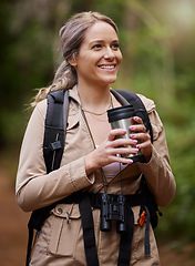 Image showing Travel, forest and woman with coffee for hiking journey, jungle adventure and nature backpack and outdoor thinking. Happy camper or hiker person trekking or explore in rainforest or tropical woods