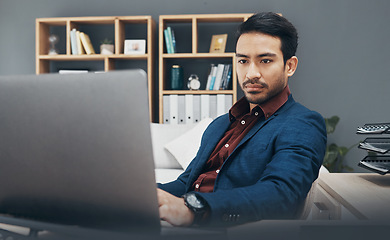 Image showing Corporate asian man, laptop and reading in office for email communication, schedule or planning. Entrepreneur, businessman or focus by computer for web design, data analysis or agenda on digital app