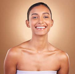 Image showing Skincare, smile and portrait of Indian woman for beauty, healthy skin and facial treatment in studio. Dermatology, luxury spa and face of happy girl confident with makeup, cosmetics and wellness