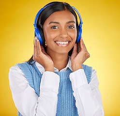 Image showing Black woman, studio portrait and headphones for music, smile or happy for makeup, beauty and aesthetic by background. Gen z model, streaming and student with cosmetics, fashion and audio on internet