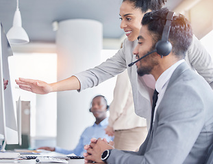 Image showing Black woman manager, call center and talking at computer desk for support, advice or help with telemarketing. Man consultant or agent with mentor for CRM, customer service or contact us consultation