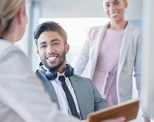 Image showing Meeting, strategy or collaboration with a business man and team in the boardroom for learning or coaching. Teamwork, planning and management with a group of people sitting in the office at a workshop