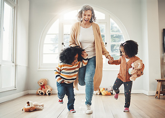 Image showing Hopscotch, grandmother and children play in home having fun, enjoy games and balance together in bedroom. Happy family, entertainment and grandma with kids for jumping, playing and numbers activity