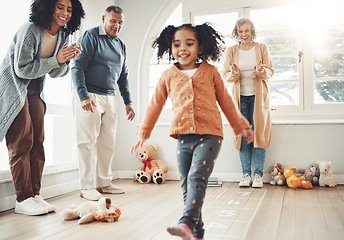 Image showing Hopscotch, happy family and parents play with girl having fun, enjoying games and relax together. Childhood, entertainment and mom, dad and girl cheer for jumping game, balance and numbers activity