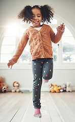 Image showing Hopscotch, happy and girl play in bedroom having fun, enjoying games and relax on weekend. Childhood, kindergarten and excited girl in bedroom for jumping game, playing and numbers activity on floor