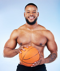 Image showing Basketball player, black man and studio portrait with smile, shirtless or happy for sports by blue background. Young fitness expert, body wellness or ball in hands for development, sport and games