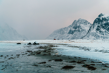 Image showing Norway coast in winter with snow bad cloudy weather