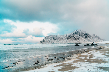 Image showing Norway coast in winter with snow bad cloudy weather