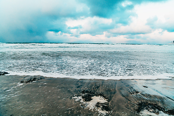 Image showing Norway coast in winter with snow bad cloudy weather