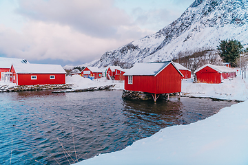 Image showing Traditional Norwegian fisherman's cabins and boats