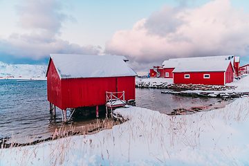 Image showing Traditional Norwegian fisherman's cabins and boats