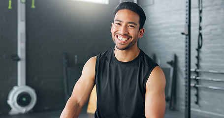 Image showing Fitness, exercise and laughing with a man in a gym for a workout or training to get strong or healthy. Wellness, smile and portrait with a happy young male athlete in a health club for exercising