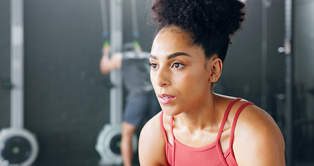 Image showing Fitness, gym and woman tired from training and exhausted with body fatigue in a difficult exercise workout. Breathe, challenge and healthy sports athlete or girl resting for energy on a cardio break