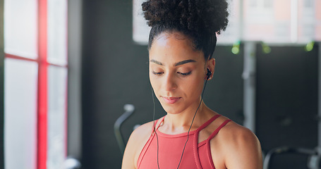 Image showing Black woman, breathe and earphones for music with fitness and exercise ready in gym, health and active motivation. Start, workout and calm for body training and endurance, wellness and listening.