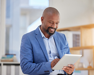 Image showing Smile, tablet and search with black man in office for digital, communication and email. Internet, technology and corporate with male employee in agency for planning, browsing online and networking