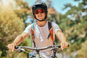 Image showing Cycling, fitness and portrait of man on mountain bike for extreme sports, adventure and adrenaline junkie. Happy, smile and training with male athlete in nature for cardio endurance, race and action