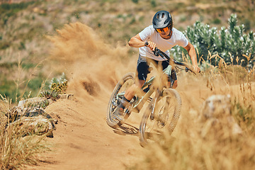 Image showing Extreme sports, cycling and man on bicycle in the countryside for fitness, stunt and freedom. Nature, biking and sporty male cyclist training, practice and speed, action and free on Mexico dirt road