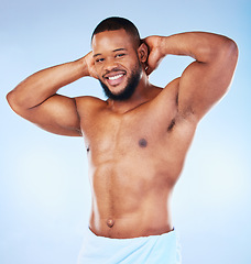 Image showing Portrait, body care and man in studio for cleaning, grooming or hygiene against blue background. Face, shower and male wellness model relax for beauty, routine and self care while posing isolated