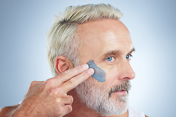 Image showing Beauty, skincare and facial with man in studio for cleansing, detox and spa treatment. Cosmetics, mud mask and dermatology with senior model on gray background for anti aging, product and natural