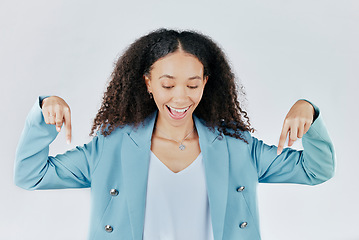 Image showing Advertising, excited and woman pointing down at product placement, deal or sale isolated in studio white background. Happy, smile and cheerful businesswoman smiling for promotion announcement