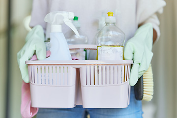 Image showing Basket, bucket and hands holding cleaning equipment and disinfectant spray products or supplies for hygiene. Service, housekeeping and person or cleaner with domestic container for sanitizing