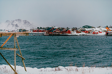 Image showing Traditional Norwegian fisherman's cabins and boats