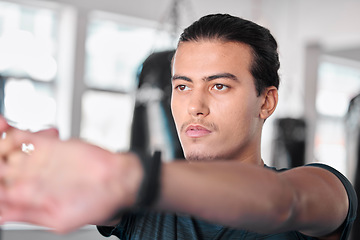 Image showing Hands, stretching fingers and man in gym ready to start workout, training or exercise. Sports fitness, thinking and serious male athlete warm up, stretch or prepare for exercising for flexibility.