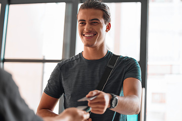 Image showing Credit card, man smile and payment at gym for fitness membership or exercise subscription. Fintech pos, ecommerce and happy athlete buying or paying for workout or training bill at exercising club.