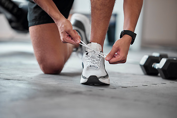 Image showing Fitness, hands and tie shoes in gym to start workout, training or exercise. Sports, athlete and man tying footwear or sneakers to get ready or prepare for running, cardio or exercising for health.