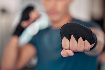 Image showing Man, fist and boxing, fitness and martial arts in gym, exercise and power, strong person and punch. Workout, male boxer training in combat and sports, athlete ready to fight and mma fighter hand zoom