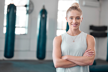 Image showing Portrait, gym and smile of woman with arms crossed ready to start workout, training or exercise. Sports, fitness and happy, proud and confident female athlete from Canada preparing for exercising.