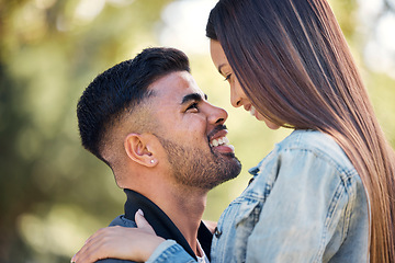 Image showing Face, love and a couple in the garden together, feeling happy while dating for romance in summer. Smile, park or spring with a man and woman bonding outside in nature as a romantic partnership