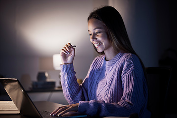 Image showing Woman, happy or laptop reading in night studying, education or homework research in living room on internet elearning. Smile, student or notes planning on technology in dark house for college degree