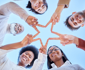 Image showing Star, low angle or happy team with peace sign, diversity or community collaboration with blue sky. Portrait, smile or group of people smiling with support, solidarity or motivation together outdoors