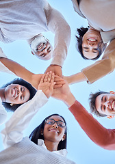 Image showing Low angle, hands or happy people portrait in meeting for innovation, success or project development. Collaboration huddle, teamwork or group of men or women with goals, strategy plan or mission