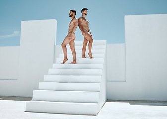 Image showing Posing, artistic and men on stairs in the nude for creativity, modeling and sensuality. Standing, looking and macho naked guys on steps for art, creative expression and freedom in nudity together