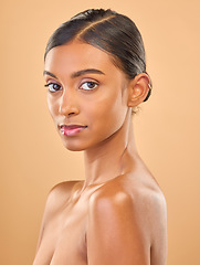 Image showing Face portrait, skincare and beauty of woman in studio isolated on a brown background. Makeup, natural cosmetics and serious Indian female model with spa facial treatment for healthy or flawless skin.