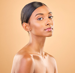 Image showing Beauty portrait, face and a woman in studio for skincare, cosmetics, dermatology or makeup. Aesthetic female for self care, natural skin and spa facial shine or wellness results on a brown background