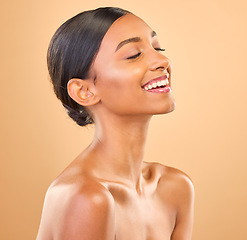 Image showing Beauty, face and smile of woman for skincare in studio with cosmetics, dermatology or makeup. Aesthetic female .laughing for self care, natural skin and spa facial shine results on a brown background